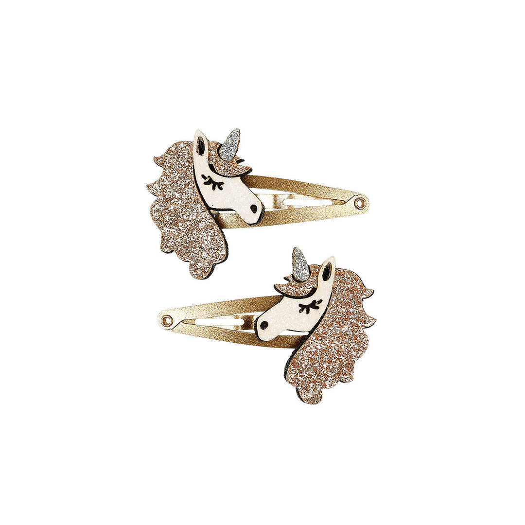 Two Souza Willow hair clips with white unicorns and gold-coloured glittery manes.