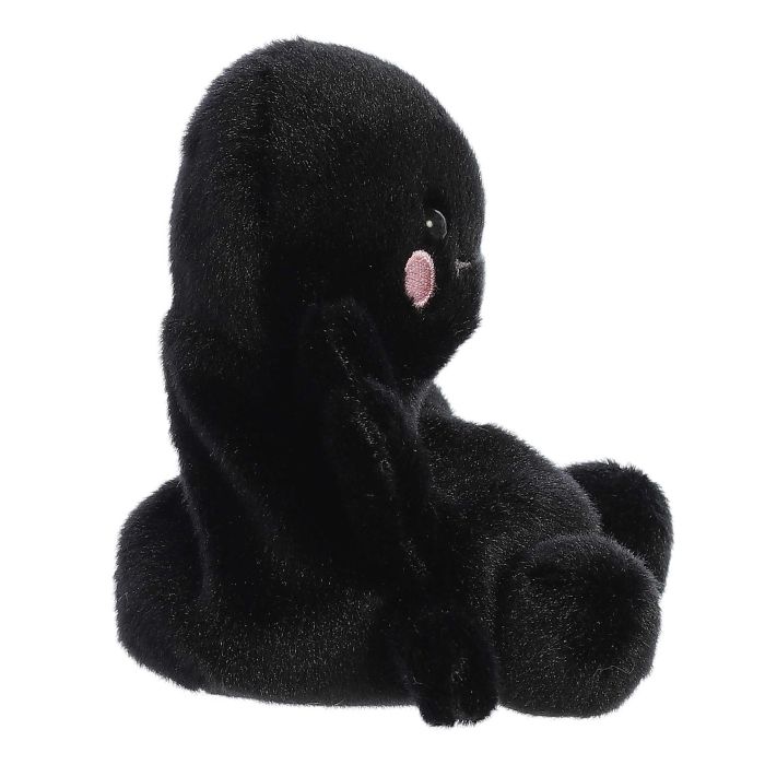 Zijaanzicht van de zwarte Aurora Palm Pals-spinknuffel met roze wang, op witte achtergrond.
