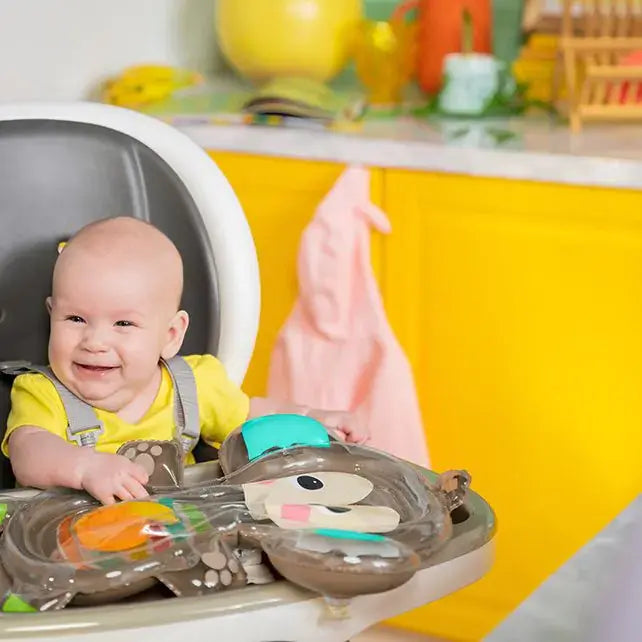 Bright Starts Hungry Monkey water mat – baby playing in a high chair