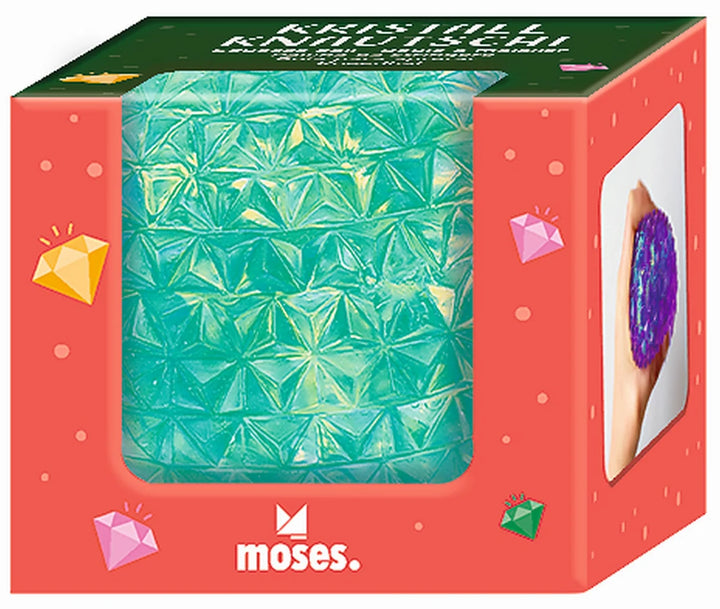 Balle anti-stress turquoise Moses à relief cristallin dans son emballage.