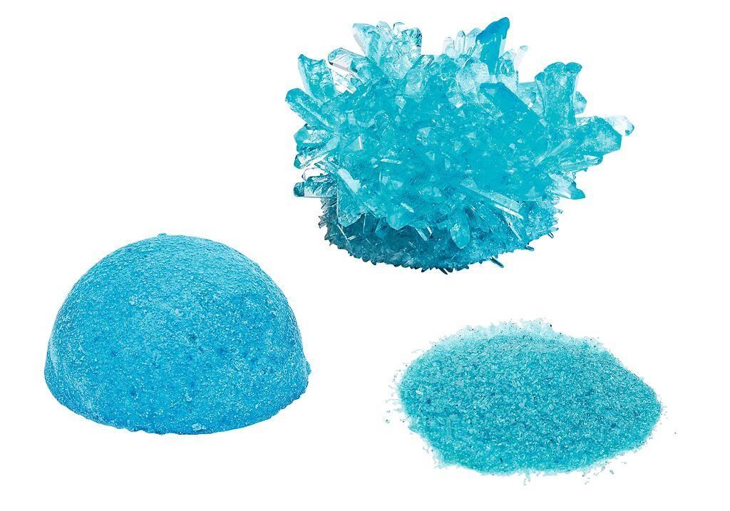 Blauwe kristalvorm, halve bol en poeder uit de Moses PhänoMINT Glow-experimentenset.