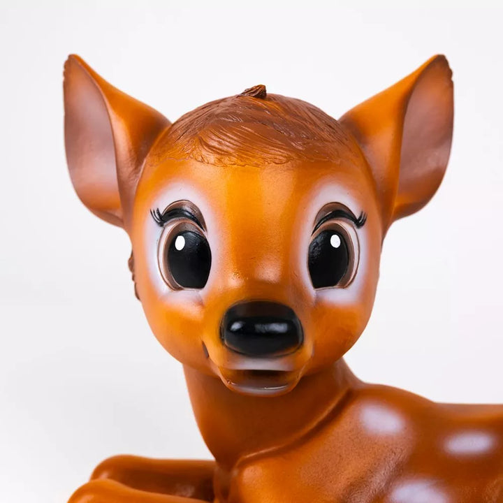 Close-up of the Egmont Toys lying fawn lamp’s head, with large ears and black eyes