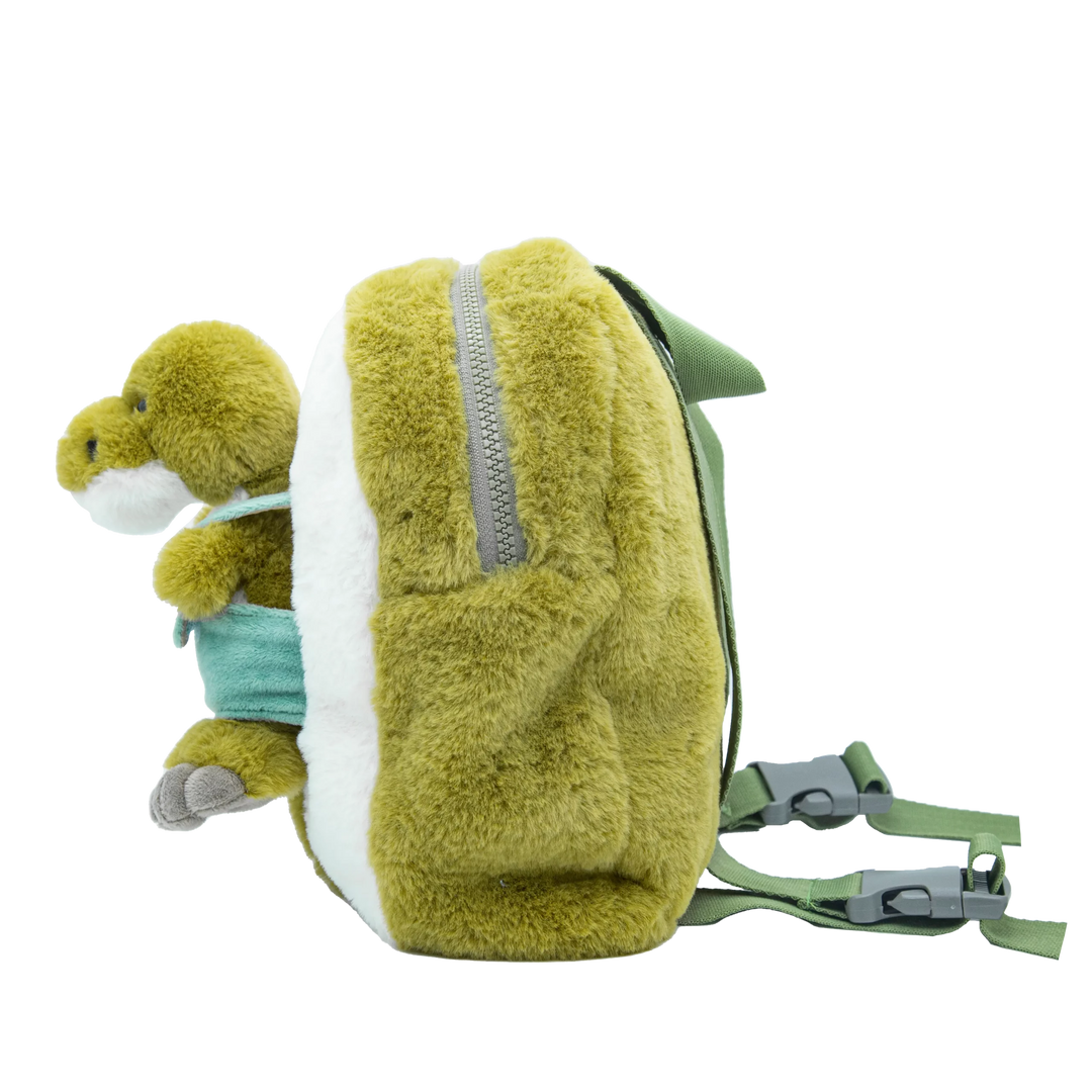 Side view of the plush dinosaur backpack with zip and adjustable straps