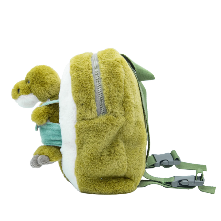 Side view of the plush dinosaur backpack with zip and adjustable straps