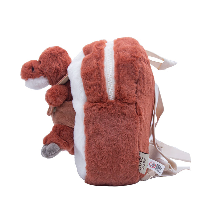 Side view of the red-brown dinosaur backpack with zip compartment