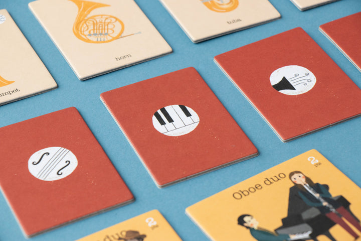 Face-down instrument cards and music cards from Il Concerto