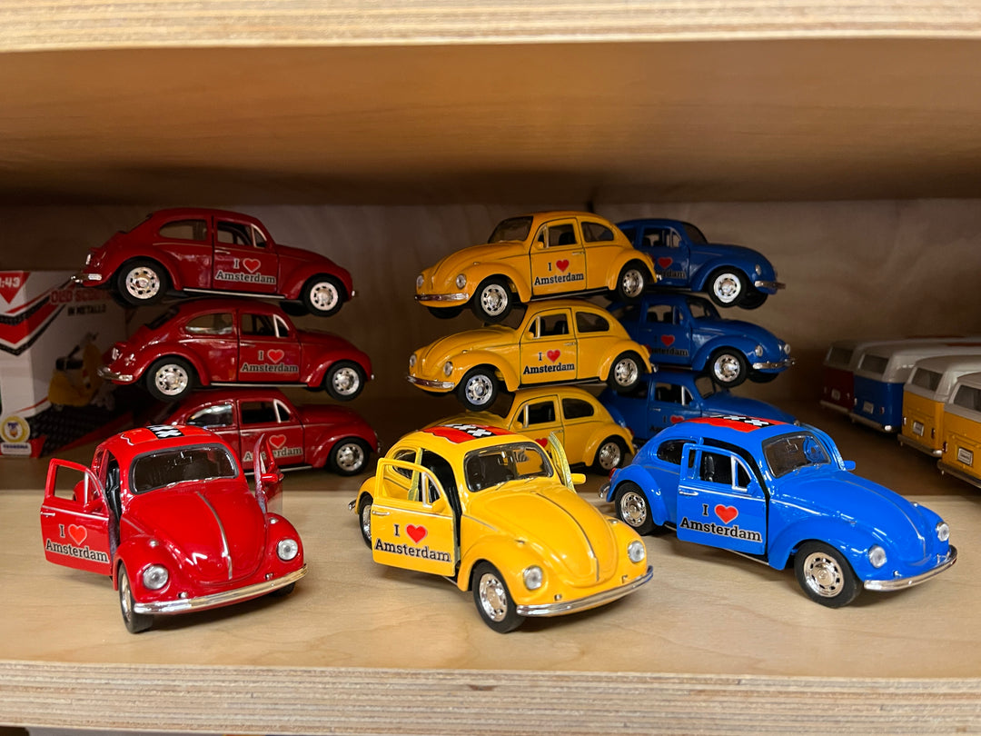 Welly Volkswagen Beetle I Love Amsterdam: three coloured cars with open doors and Amsterdam crosses on the roof.