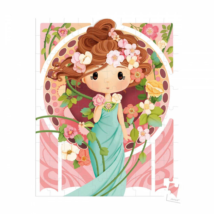 Janod Puzzle inspiriert von Mucha mit einer Frau im türkisfarbenen Kleid, Blumen und losen Randteilen.