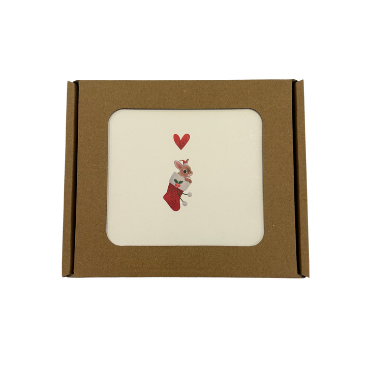 Yon Christmas box 6 with a rabbit in a red Christmas stocking and a red heart on the front card