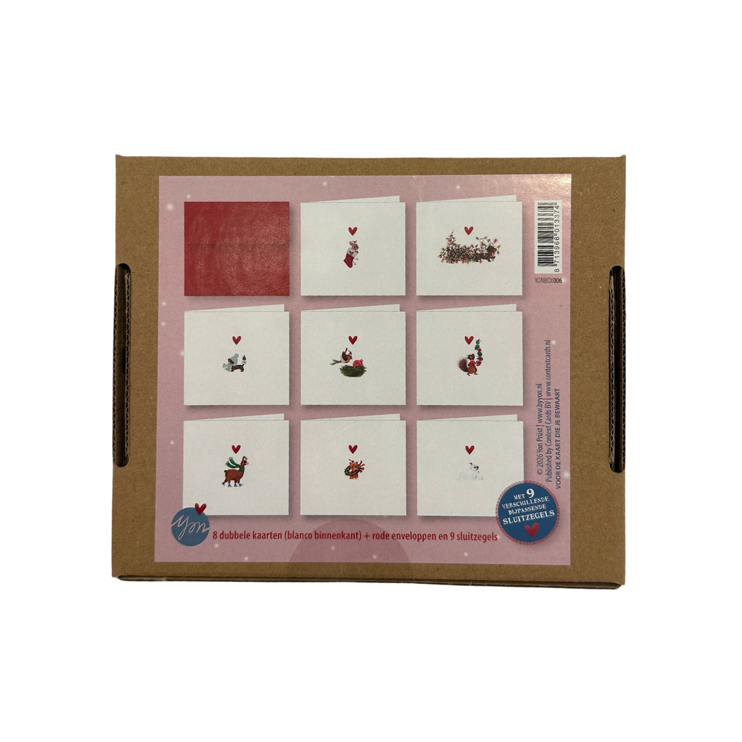 Back of Yon Christmas box 6 showing the eight card designs, a red envelope and envelope seal information