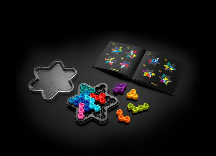 IQ Star Deluxe with board, puzzle pieces, lid and open challenge book
