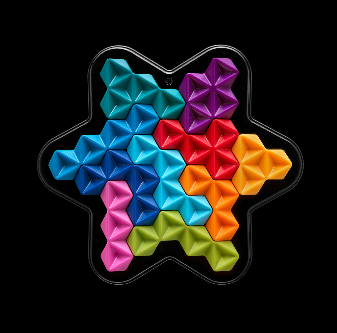 Star-shaped IQ Star Deluxe board filled with coloured puzzle pieces