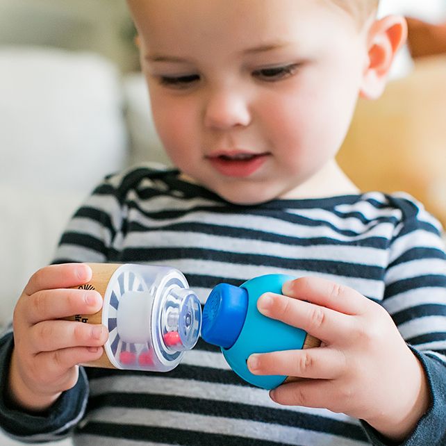 Baby Einstein Four Fundamentals – child playing with the toy