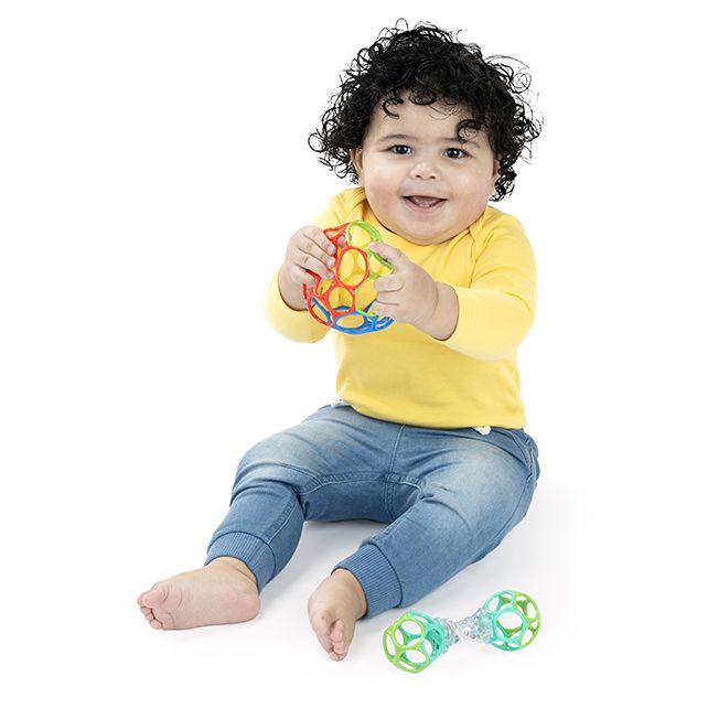 Bright Starts Oball Grasp the Day – bébé avec le jouet