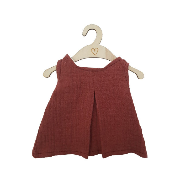 Plum coloured Hollie doll dress on a wooden hanger