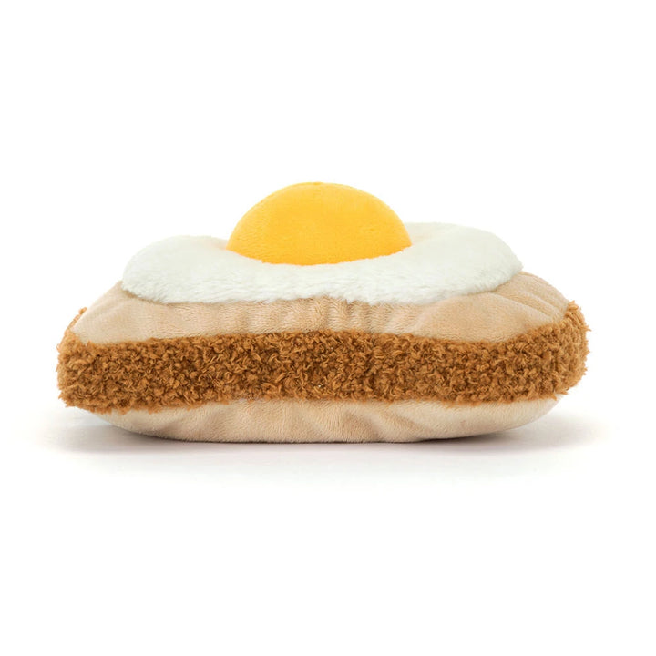 Jellycat Egglantine Egg On Toast von hinten mit brauner Brotkruste und gelbem Eigelb