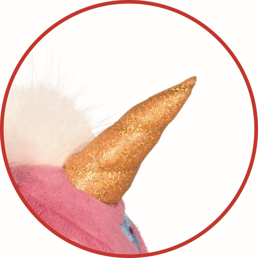 Detail of Berry unicorn's shimmering golden horn