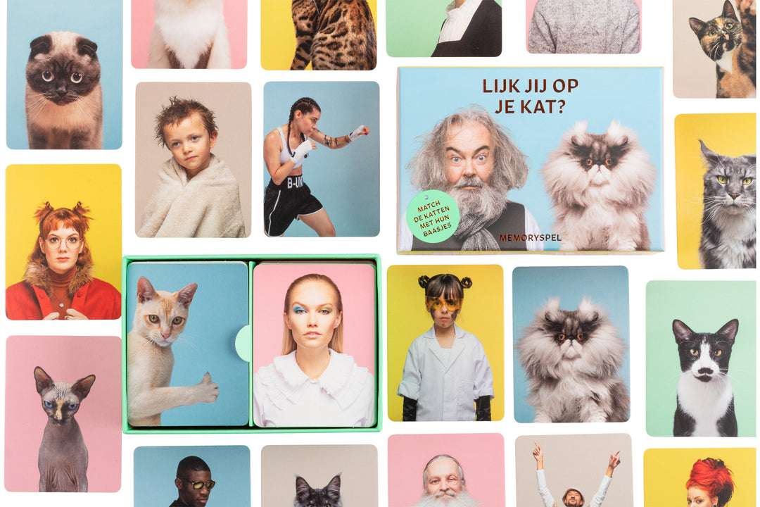 Lijk jij op je kat? | Selection of cards beside the Dutch box
