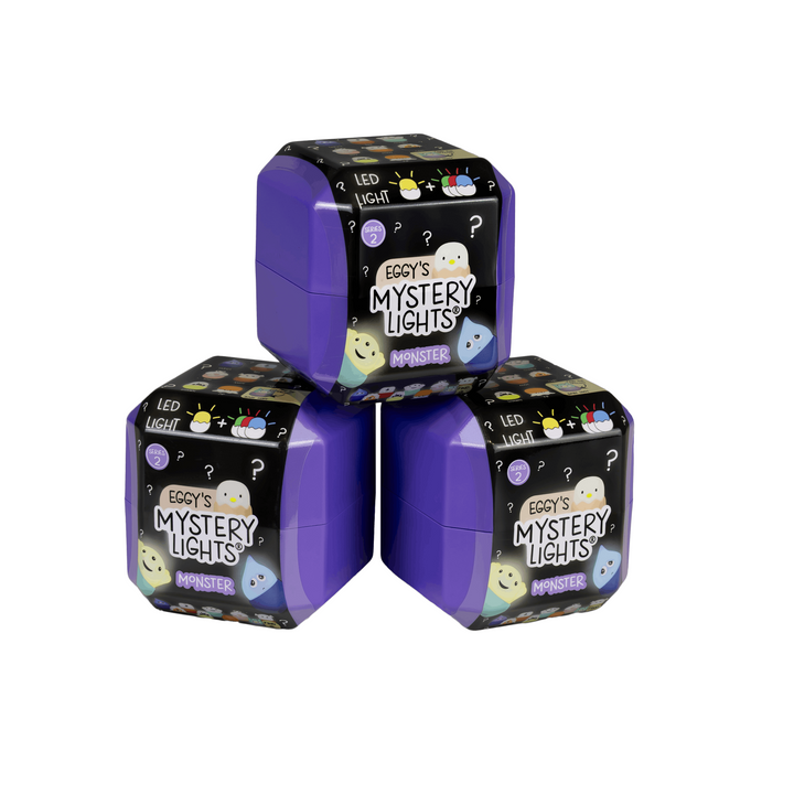Drei gestapelte lila Eggy Mystery Lights Monsters-Blindboxen.