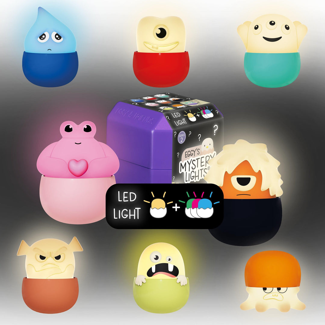 Eggy Monsters-Figuren mit farbiger Beleuchtung vor dunklem Hintergrund.