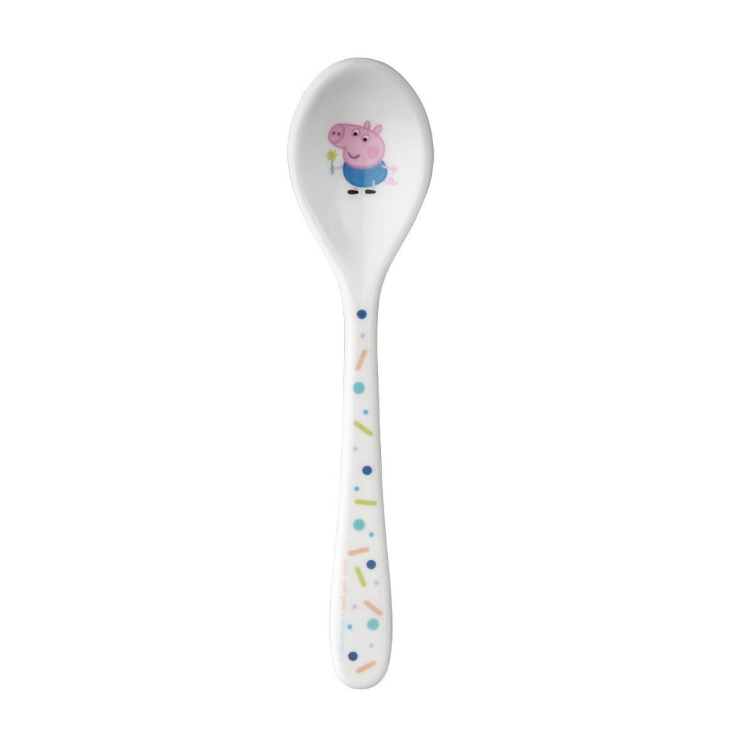 White Petit Jour Peppa Pig spoon with Peppa in the bowl and small illustrations on the handle.
