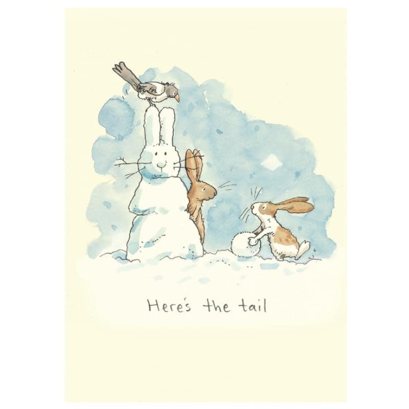 Rabbits stand beside a snowman with a bird perched on its head.